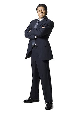 simsearch:640-01348387,k - Businessman posing with crossed arms Stock Photo - Premium Royalty-Free, Code: 640-01348395
