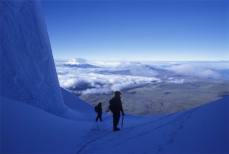 simsearch:640-01349855,k - Two people trekking on a snow covered mountain Foto de stock - Sin royalties Premium, Código: 640-01348464