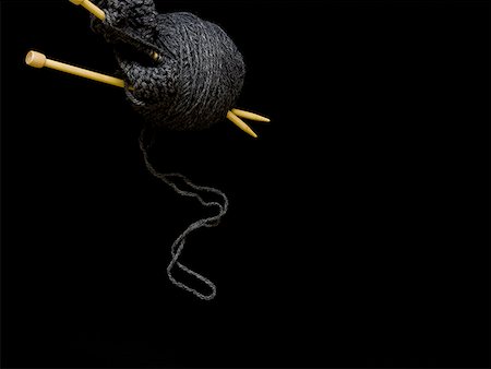 Knitting needles with black yarn Stock Photo - Premium Royalty-Free, Code: 640-01348540