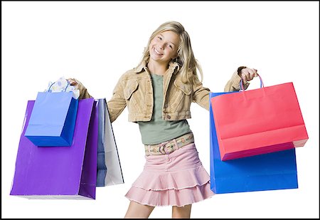 simsearch:640-01360910,k - Portrait of a girl holding shopping bags and smiling Stock Photo - Premium Royalty-Free, Code: 640-01348788