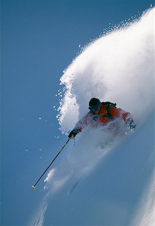 simsearch:640-01362181,k - Downhill skier skiing on mountain Foto de stock - Sin royalties Premium, Código: 640-01348885