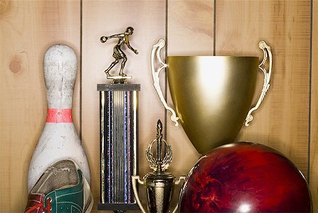 Bowling ball and pin with shoe and trophies Stock Photo - Premium Royalty-Free, Code: 640-01348897