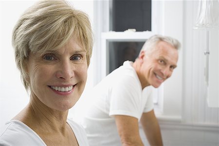 Portrait of a mature couple smiling Stock Photo - Premium Royalty-Free, Code: 640-01348909