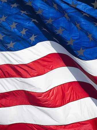 dia da independência - Close-up of the American flag Foto de stock - Royalty Free Premium, Número: 640-01348977