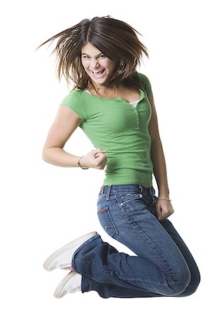 Portrait of a teenage girl jumping in mid-air Stock Photo - Premium Royalty-Free, Code: 640-01348989