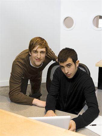 simsearch:640-01357111,k - Portrait of two young men in front of a laptop Foto de stock - Sin royalties Premium, Código: 640-01349160