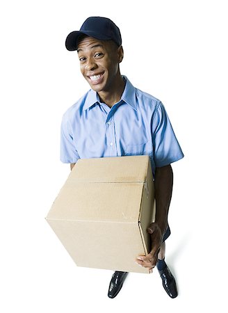 delivery african ethnicity - Portrait of a delivery man Stock Photo - Premium Royalty-Free, Code: 640-01349162