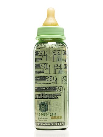 Baby bottle with US currency in it Stock Photo - Premium Royalty-Free, Code: 640-01349274