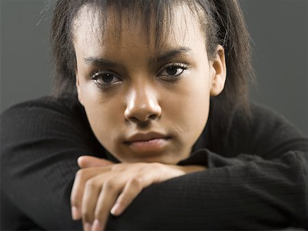 sad face kid - Close-up of a teenage girl Stock Photo - Premium Royalty-Free, Code: 640-01349277