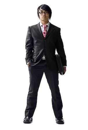 Portrait of a businessman with his hand in his pocket Stock Photo - Premium Royalty-Free, Code: 640-01349323