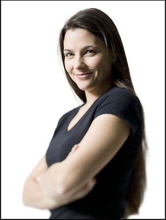 Portrait of a woman standing with her Arms Crossed Arms Folded