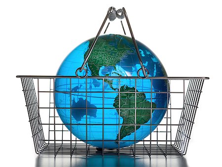 Close-up of a globe in a shopping basket Stock Photo - Premium Royalty-Free, Code: 640-01349395