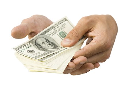 Close-up of hands holding paper currency Stock Photo - Premium Royalty-Free, Code: 640-01349510