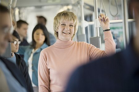 european mature women tubes - Portrait of a mature woman standing in a passenger train Stock Photo - Premium Royalty-Free, Code: 640-01349559