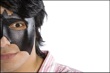 simsearch:640-01360385,k - Portrait of a young man wearing a mask Stock Photo - Premium Royalty-Free, Code: 640-01349620