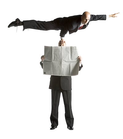 Two male acrobats in business suits performing Foto de stock - Sin royalties Premium, Código: 640-01349645