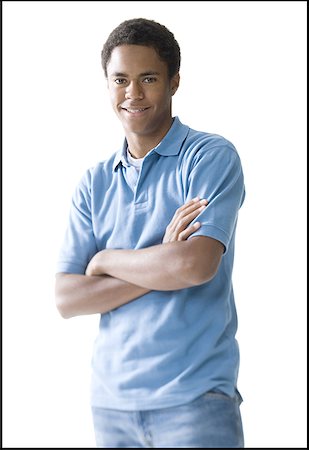 Portrait of a teenage boy smiling Stock Photo - Premium Royalty-Free, Code: 640-01349675