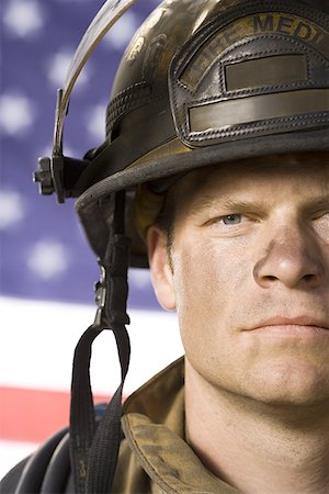 simsearch:640-03262170,k - Portrait of a firefighter with US flag Stock Photo - Premium Royalty-Free, Code: 640-01349736