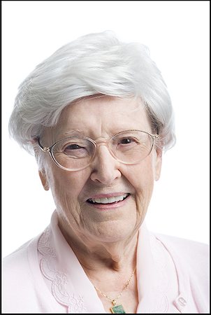 Portrait of a senior woman smiling Stock Photo - Premium Royalty-Free, Code: 640-01349917