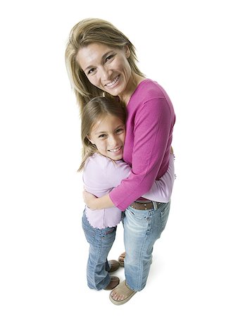 Portrait d'une fille embrassant sa mère Photographie de stock - Premium Libres de Droits, Code: 640-01349911