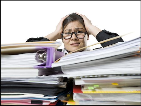 Portrait of a businesswoman looking frustrated Stock Photo - Premium Royalty-Free, Code: 640-01354007