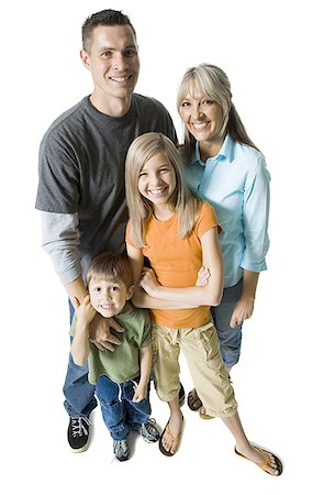 preteen boy happy white background - Portrait d'une famille souriante Photographie de stock - Premium Libres de Droits, Code: 640-01354154