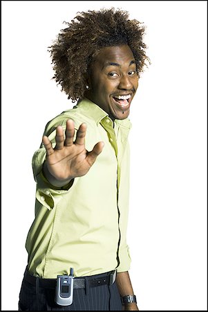 Portrait of a young man laughing Foto de stock - Sin royalties Premium, Código: 640-01354236