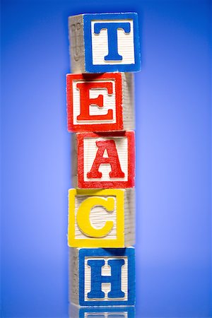 Close-up of a stack of alphabet blocks Foto de stock - Sin royalties Premium, Código: 640-01354396