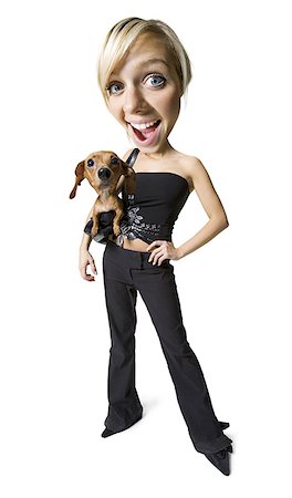 Caricature of a young woman standing with her dog Stock Photo - Premium Royalty-Free, Code: 640-01354801