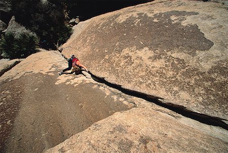 simsearch:640-01349855,k - High angle view of a person rock climbing Foto de stock - Sin royalties Premium, Código: 640-01354856