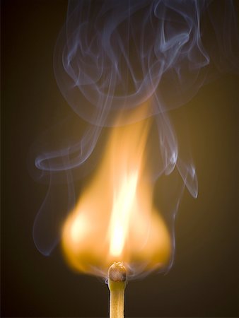 four elements - Close-up of a burning matchstick Stock Photo - Premium Royalty-Free, Code: 640-01355155