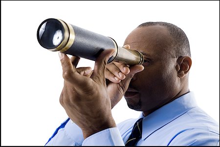 person with telescope - Businessman looking through telescope Stock Photo - Premium Royalty-Free, Code: 640-01355161