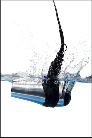 dropped in water nobody - Hair dryer dropped in water Stock Photo - Premium Royalty-Free, Code: 640-01355193