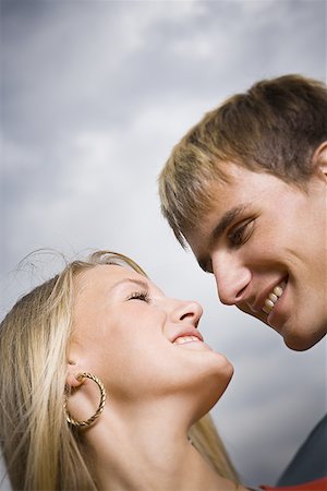 romantic girl boy pictures - Close-up of a teenage couple looking at each other Foto de stock - Sin royalties Premium, Código: 640-01355265