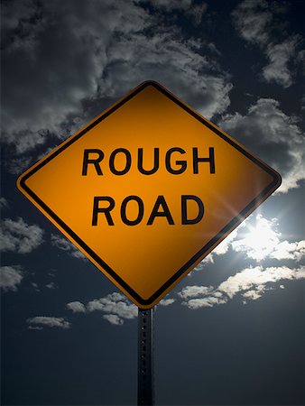 simsearch:6102-03905124,k - Low angle view of a rough road sign Stock Photo - Premium Royalty-Free, Code: 640-01355281