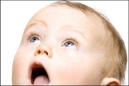 surprised toddler girl - Close-up of a baby with open mouth Stock Photo - Premium Royalty-Free, Code: 640-01355335