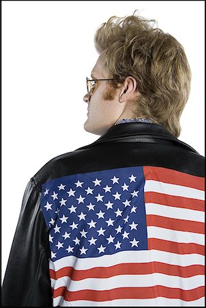 Rear view of a young man wearing a leather jacket Stock Photo - Premium Royalty-Free, Code: 640-01355429