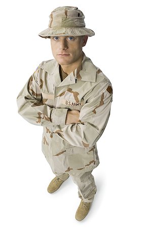 simsearch:640-01364108,k - Close-up of a soldier in a military uniform Stock Photo - Premium Royalty-Free, Code: 640-01355480