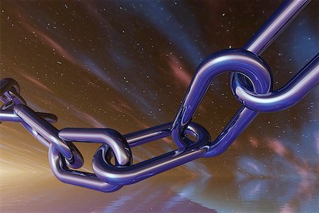 Low angle view of a metal chain in the night sky Stock Photo - Premium Royalty-Free, Code: 640-01355590
