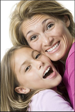 Portrait of a daughter hugging her mother Stock Photo - Premium Royalty-Free, Code: 640-01355617