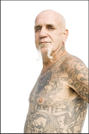 face man tatoo - Heavily tattooed man Stock Photo - Premium Royalty-Free, Code: 640-01355791