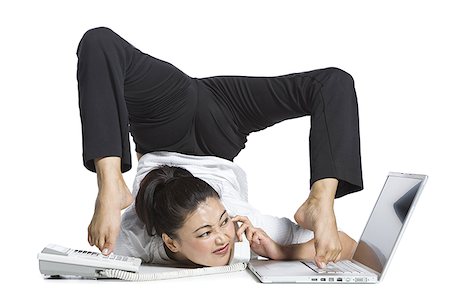 simsearch:640-02768591,k - Female contortionist businesswoman Stock Photo - Premium Royalty-Free, Code: 640-01355824