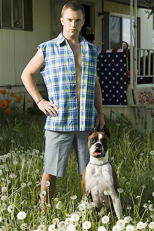 simsearch:640-01355830,k - Man in trailer park with dog Stock Photo - Premium Royalty-Free, Code: 640-01355830