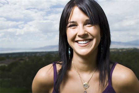 Portrait of a young woman smiling Foto de stock - Sin royalties Premium, Código: 640-01355925