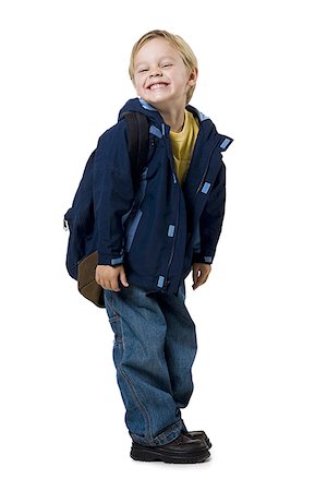 school jacket - Boy with backpack grinning Stock Photo - Premium Royalty-Free, Code: 640-01356130