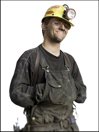 dirty overalls pictures - Portrait of a miner smiling Stock Photo - Premium Royalty-Free, Code: 640-01356218