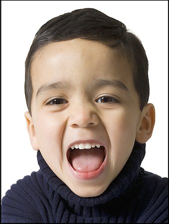 Portrait of a boy with his mouth open Stock Photo - Premium Royalty-Free, Code: 640-01356271