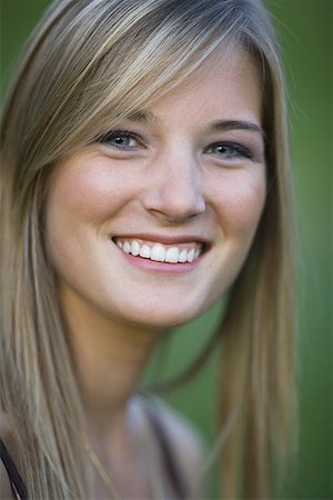 simsearch:640-01351711,k - Portrait of a teenage girl smiling Stock Photo - Premium Royalty-Free, Code: 640-01356384