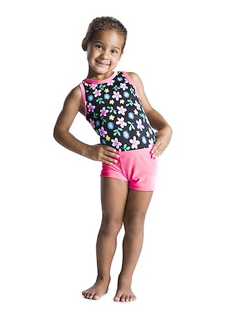 Young female gymnast with hands on hips Stock Photo - Premium Royalty-Free, Code: 640-01356414