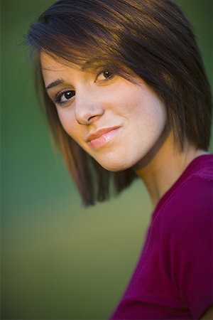 simsearch:640-03260389,k - Portrait of a young woman smiling Stock Photo - Premium Royalty-Free, Code: 640-01356554